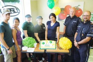 Rachel Hosseini with staff members Alana Botting and Lindsay Colliss and four regular customers at the Sharbot Lake Subway's first year anniversary celebrations on July 23